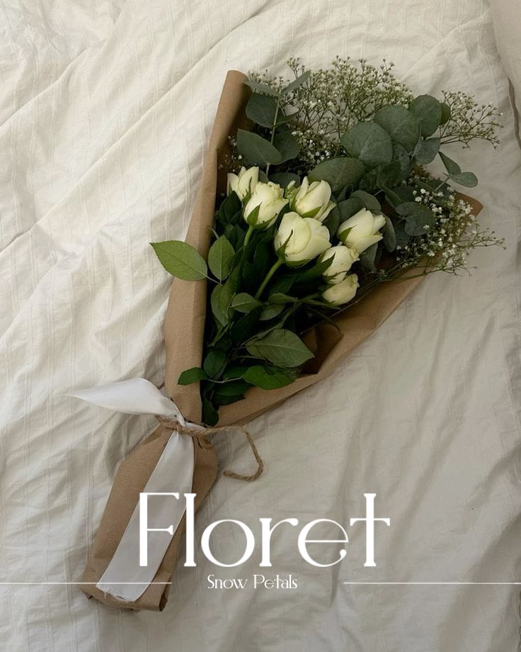 Snow Petals — Quiet white roses, dressed in kraft and eucalyptus